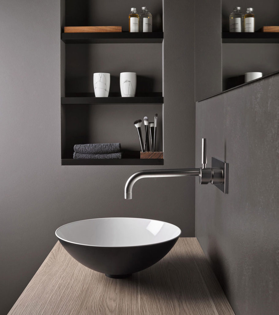 Grey contemporary free standing basin and wall mounted tap