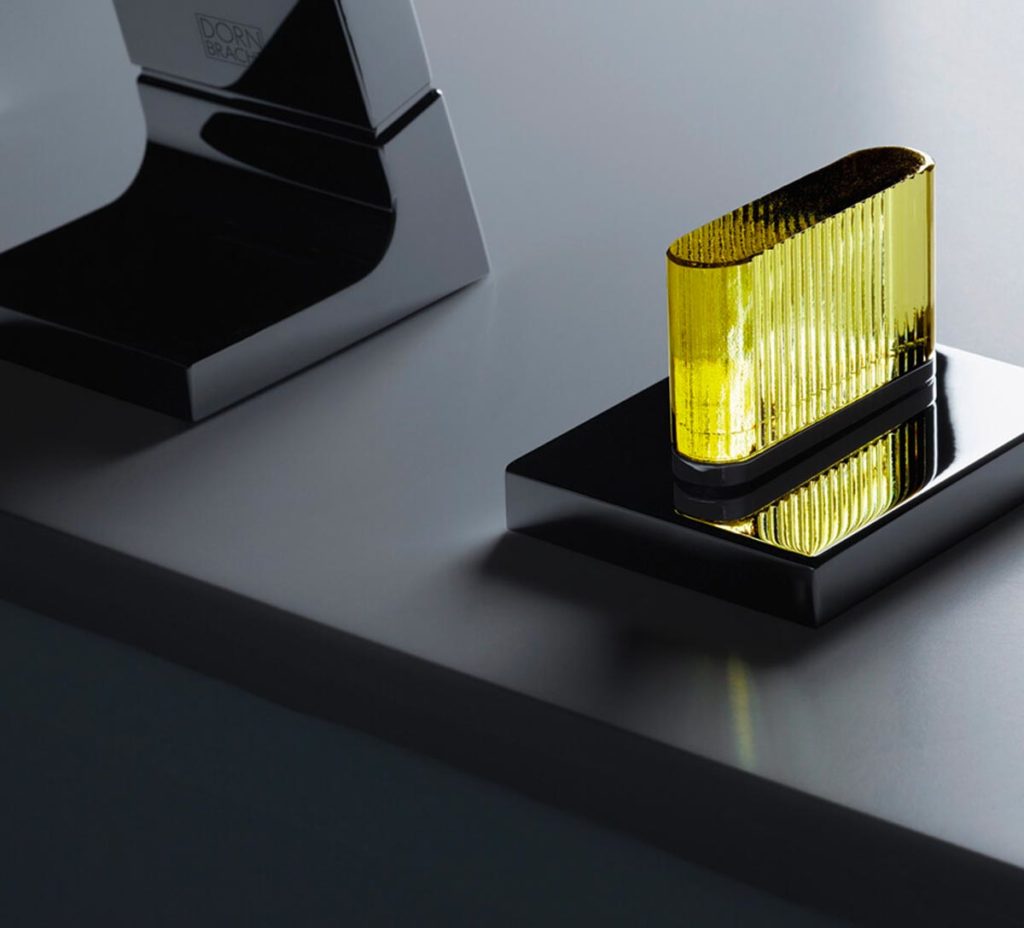 Designer bathroom taps by Dornbracht in black and gold